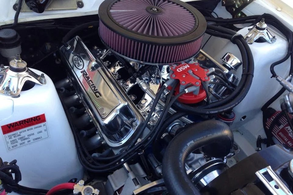 Performance engine bay with chrome rocker covers and a high flow air cleaner